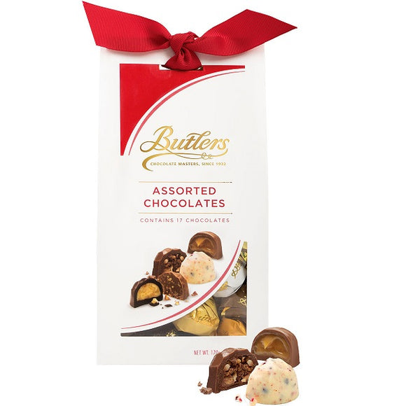 Chocolate truffles individually wrapped. Packed in a gift box tied with a red ribbon. Brand: Butlers, Ireland.