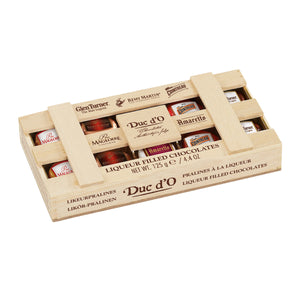 Liqueur-Filled Chocolates 10pc Assortment Crate. Belgian chocolate with premium liqueurs. Brand: Duc d’O, Belgium.