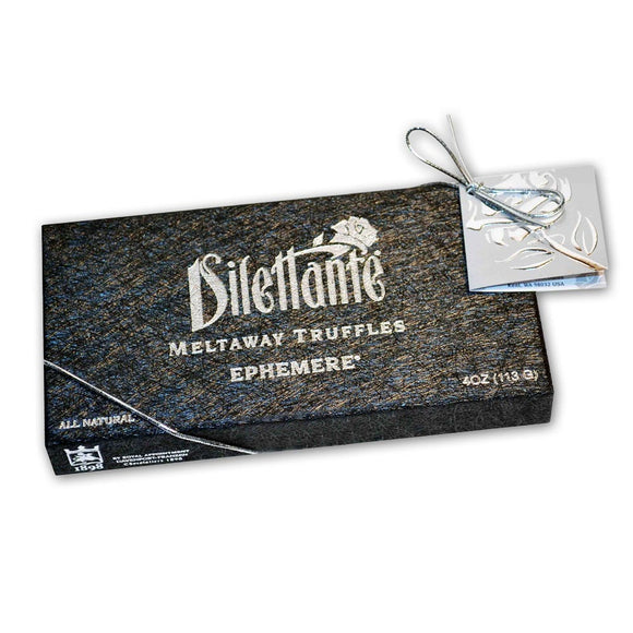 Truffle ganache dipped in chocolate packed in a gift box. Brand: Dilettante, USA.
