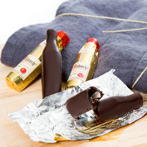 Bottle-shaped dark chocolates filled with Asbach Uralt Brandy. Brand: Asbah, Germany.