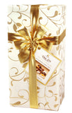 Liqueur-Filled Assorted Pralines Gift Box. Belgian chocolate - white, milk and dark chocolate assortment with premium liqueurs. White box wrap. Brand: Duc d’O, Belgium.